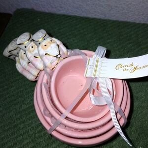Pink nutcracker measuring cups